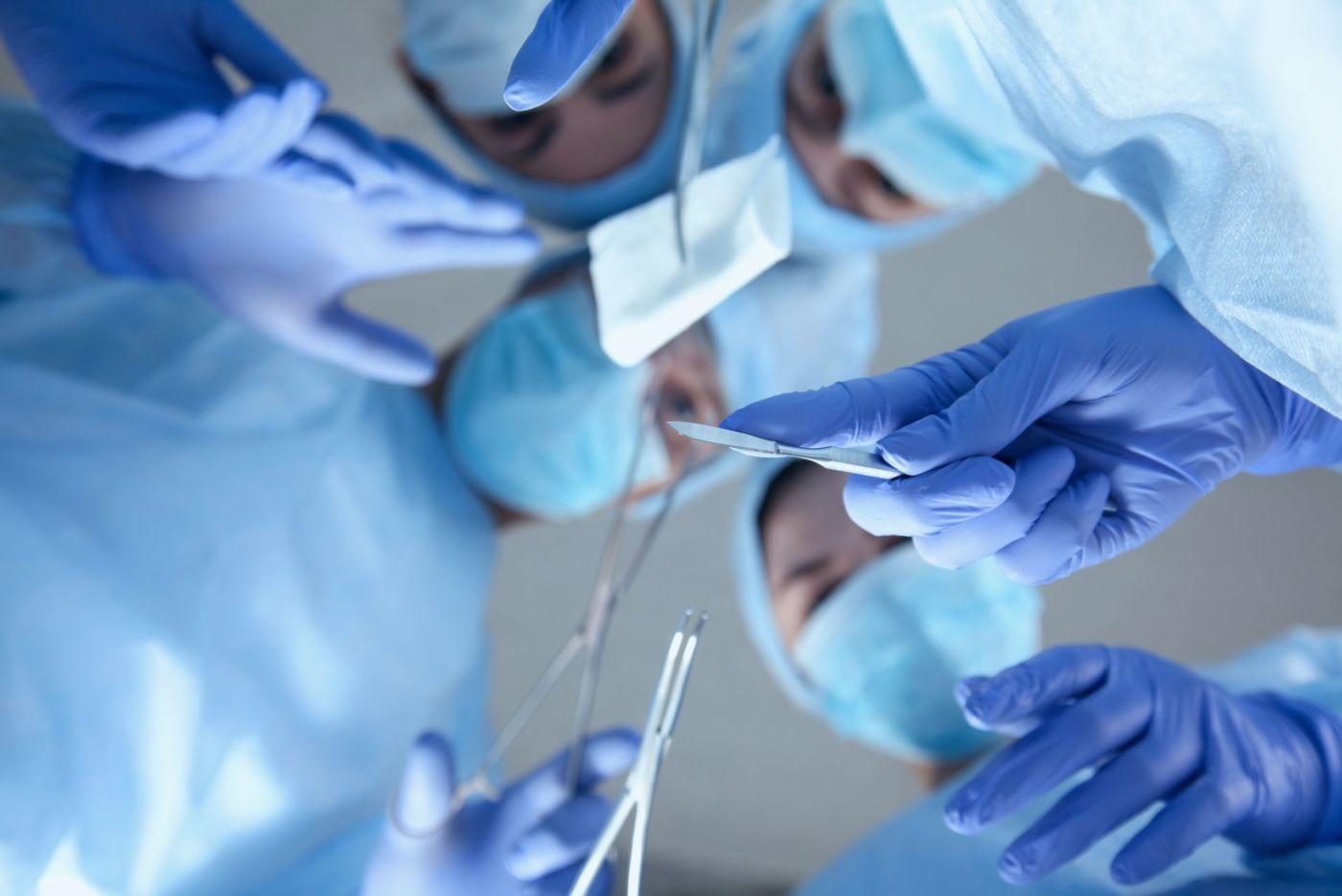 Patient point of view of doctors performing an operation.