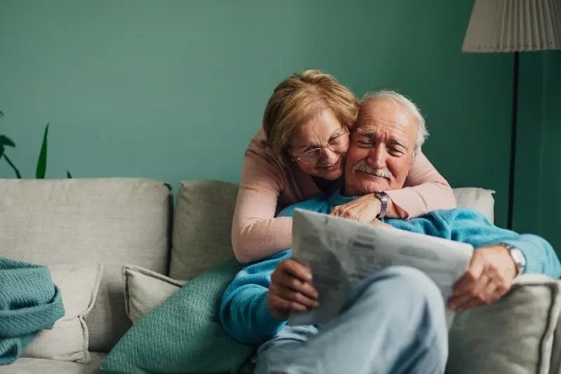 older couple talking about getting a personal loan